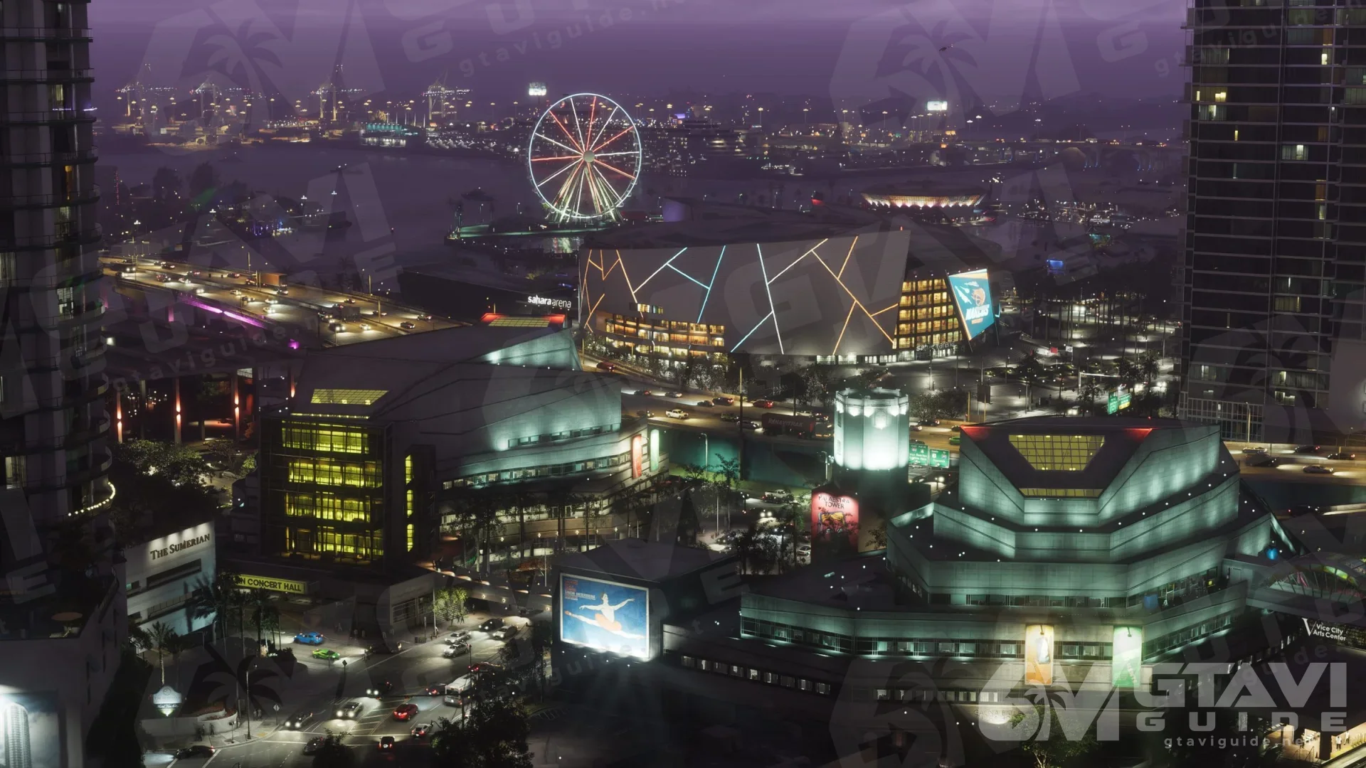 Vice City at night with a lit Ferris wheel, an arena and waterfront buildings
