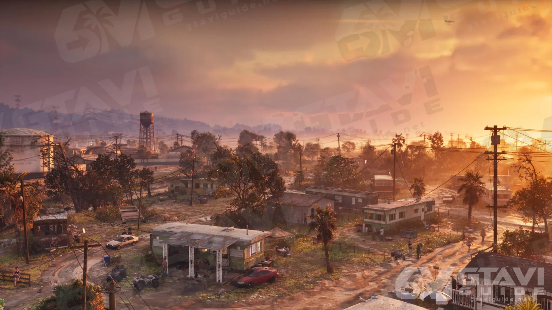 Port Gellhorn at sunset, with a water tower and rows of houses