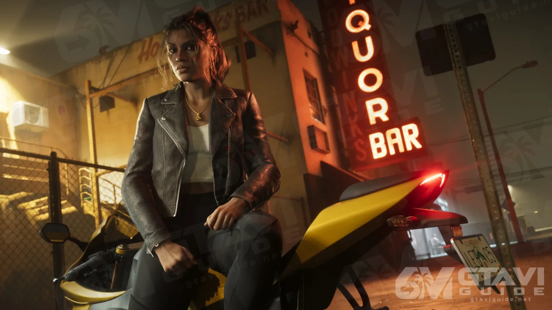 Lucia leaning on her motorcycle outside a bar at night